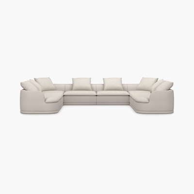 An Atlason Composed Modular Sofa U Shape Sectional in Turf: Cream Melange viewed from the front.
